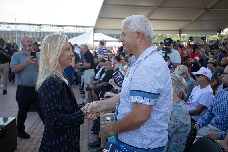 Mayor Deegan speaking with a man at Memorial Day 2026 service