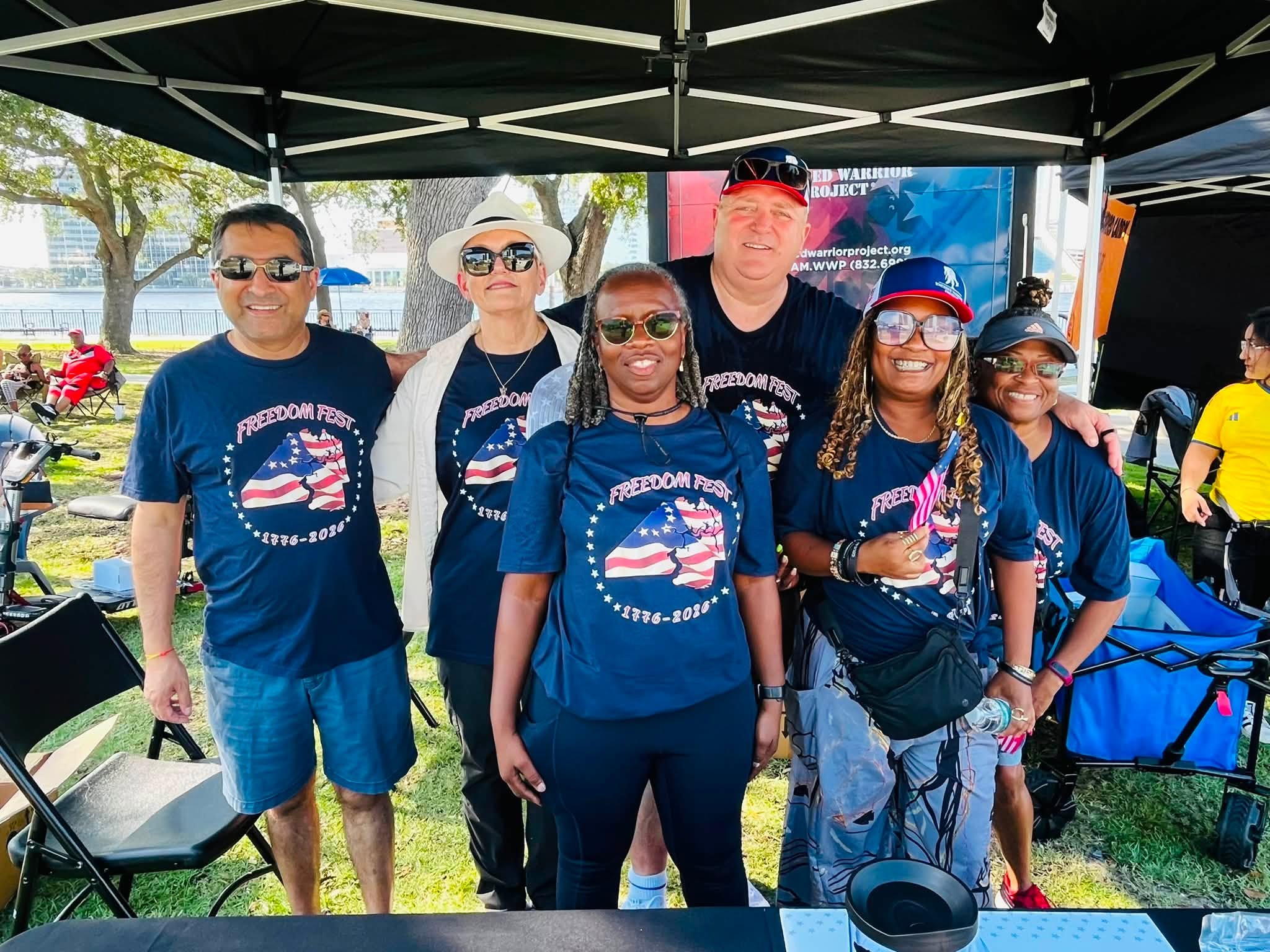 6 staff members of Wounded Warrior posing for picture