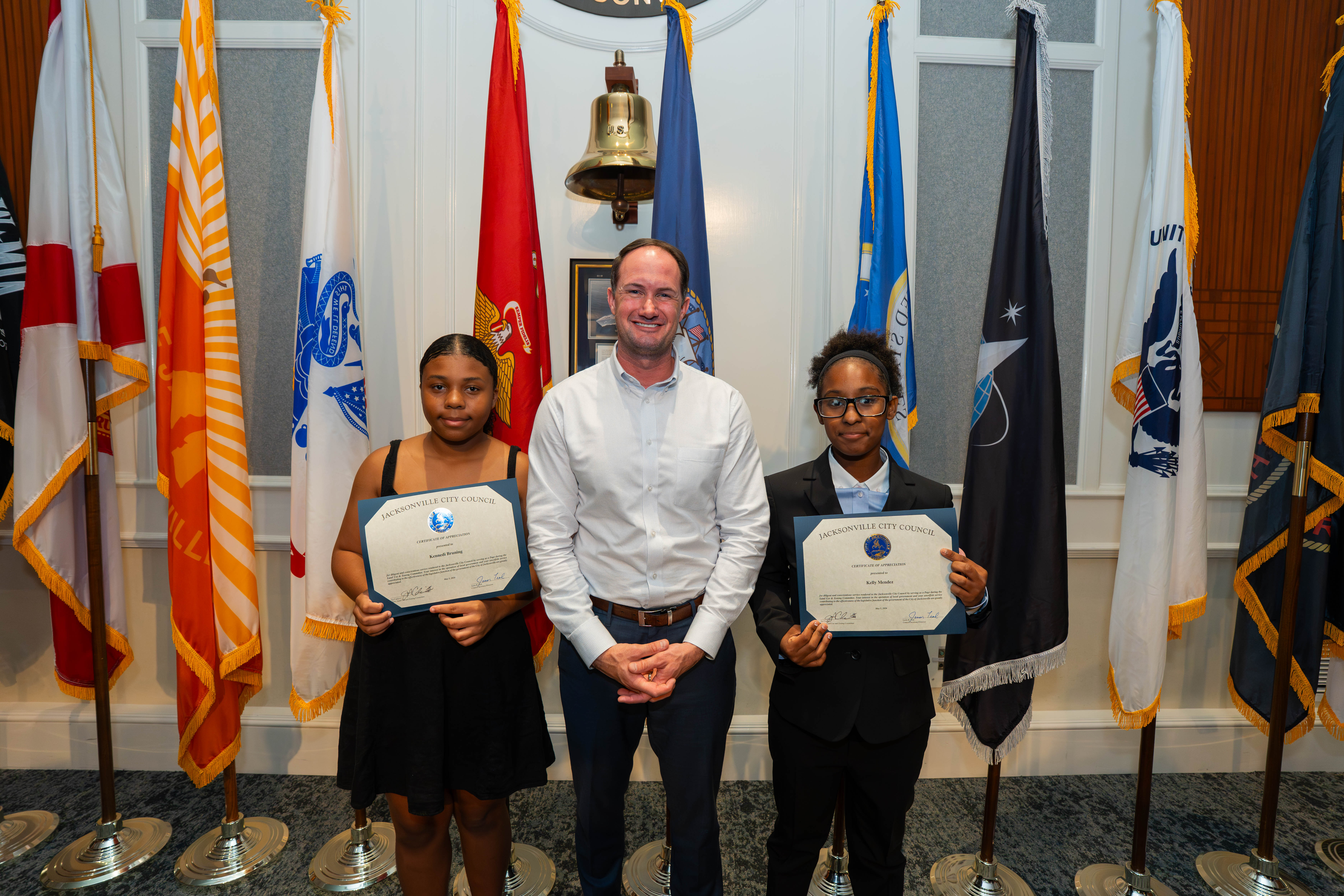 Program participant Kennedi Bruning, CM Joe Carlucci, Page Program participant Kelly Mendez. 