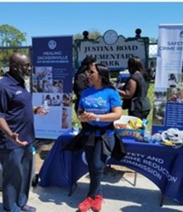 people speaking at community event