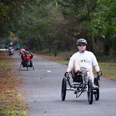 Adaptive Cycling, citizen enjoying the Baldwin Rail Trail on a beautiful day