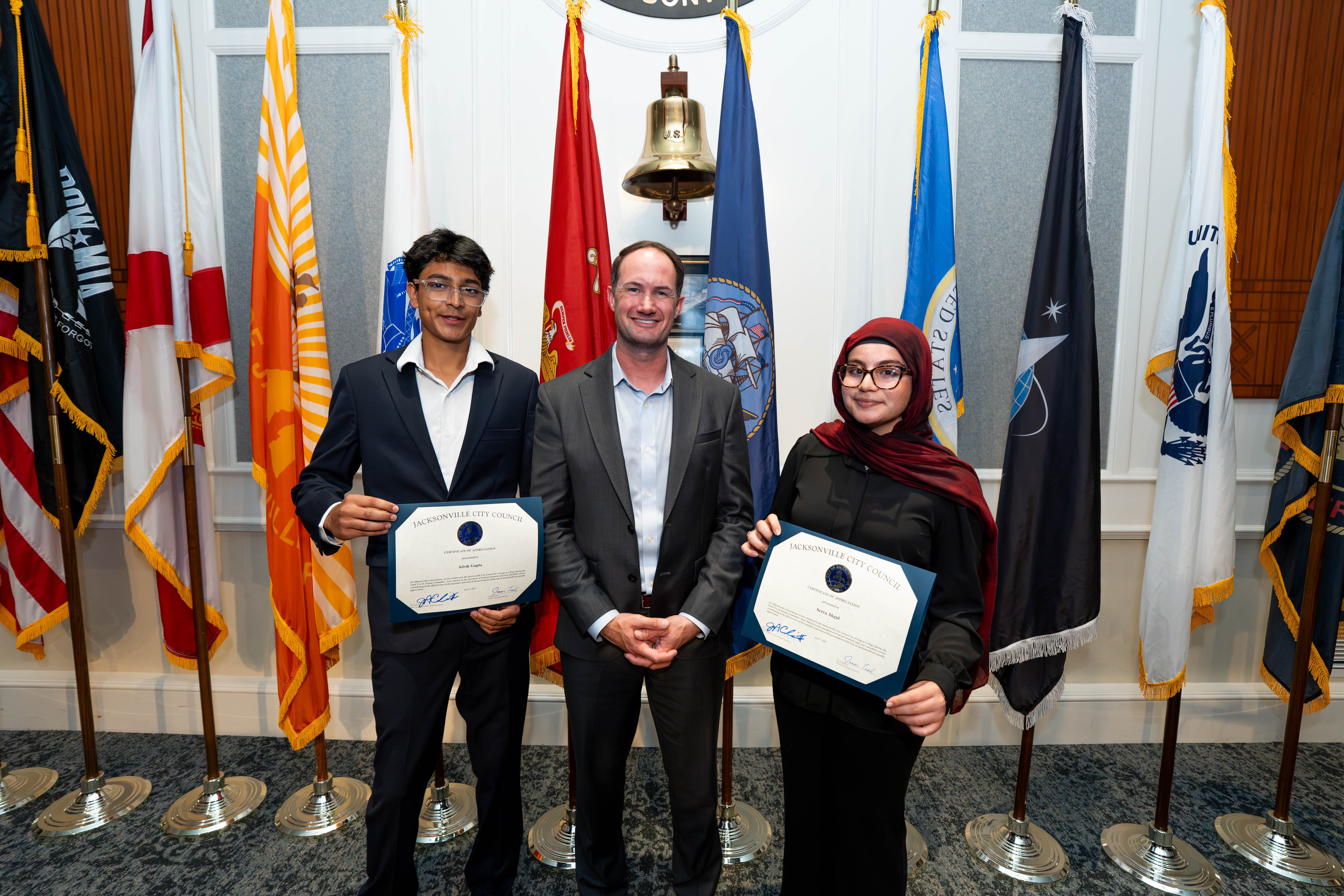 Page Program participant Advik Gupta, CM Joe Carlucci, Page Program participant Serra Akgul on April 7, 2026, at the Land Use & Zoning Committee meeting.