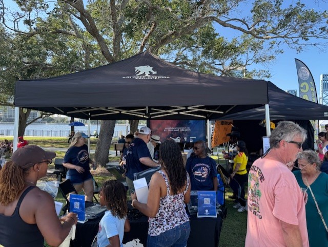 Sponsors of Freedom Fest 2026 Wounded Warrior staff engaging with audience