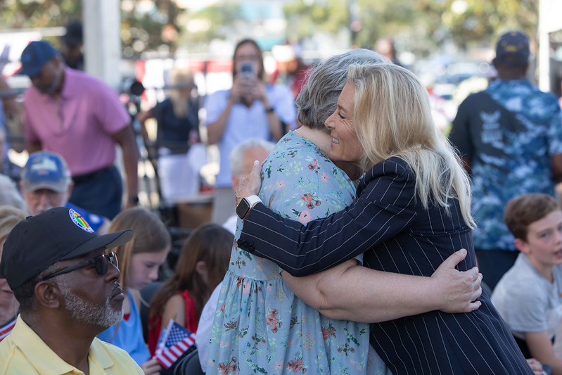 Mayor Deegan hugging woman at Memorial Day 2026 service
