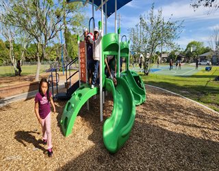 Robert F. Kennedy Community Center kid playing at the park