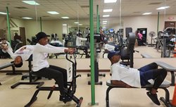 Two people working out in Forestview Fitness Center