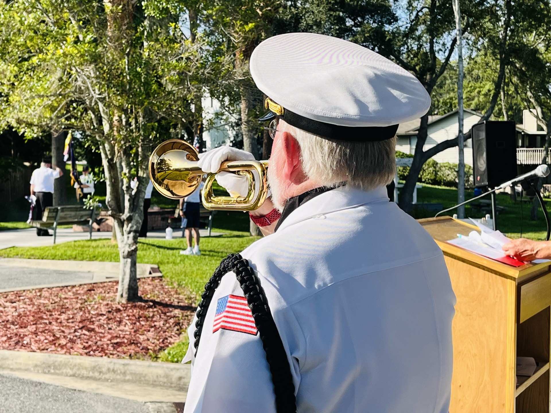 American Legion bugler playing Taps at 250 Flag Retirement Ceremony at the American Legion 283