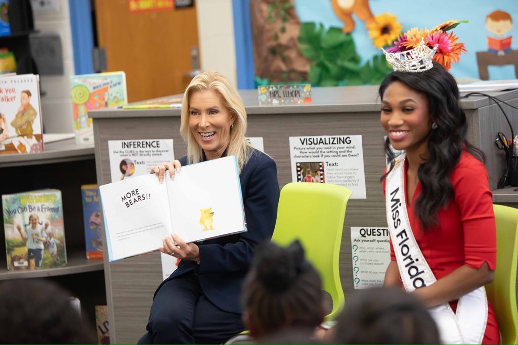 Mayor Donna Deegan and Miss Florida 2025 Paris Richardson  read books to group of children