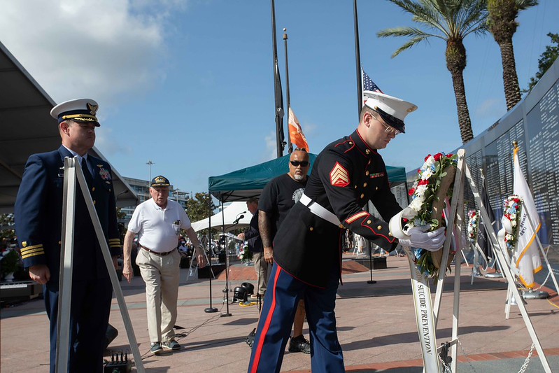 Marine placing wreath for Memorial Day 2026