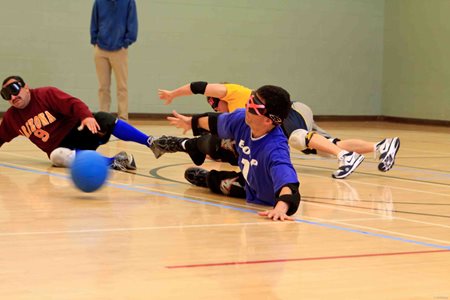 An image of players in the middle of a goalball game