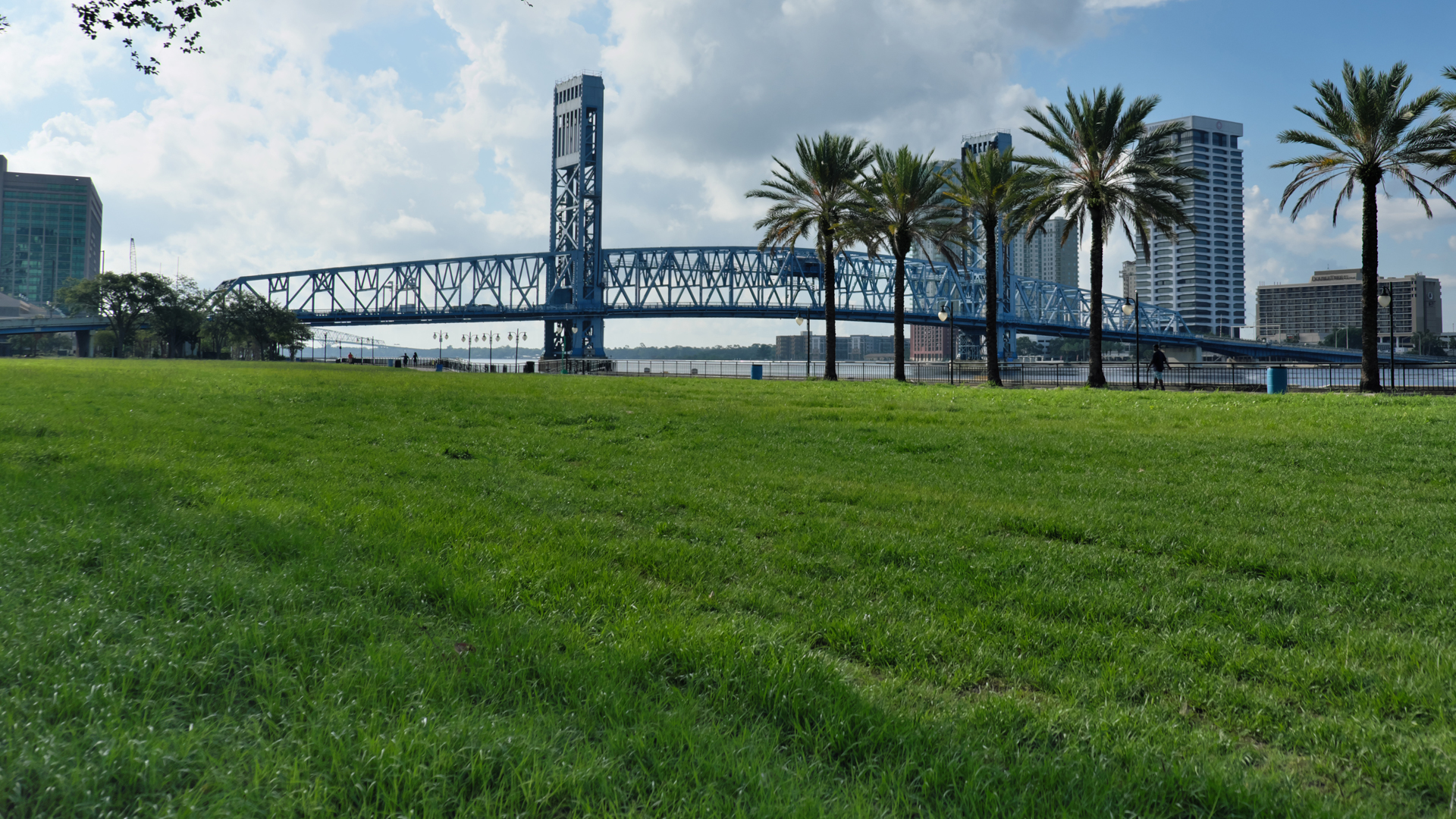 The main street bridge viewed from a park along the river downtown