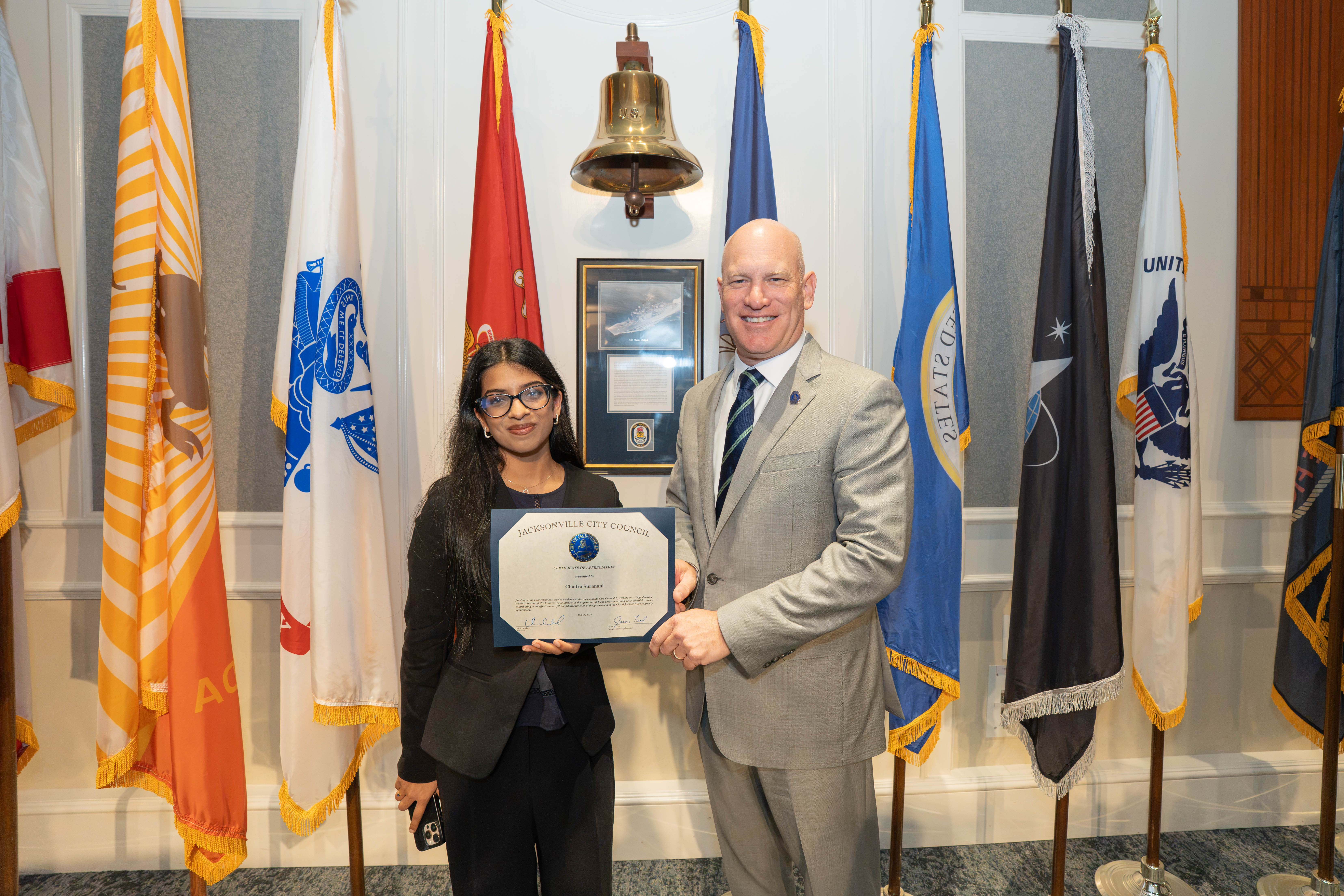 CP Howland pictured with Page Program participant Chaitra Suranani following the certificate presentation on July 28, 2026, at the City Council meeting in the City Council Chamber, Jacksonville, FL.