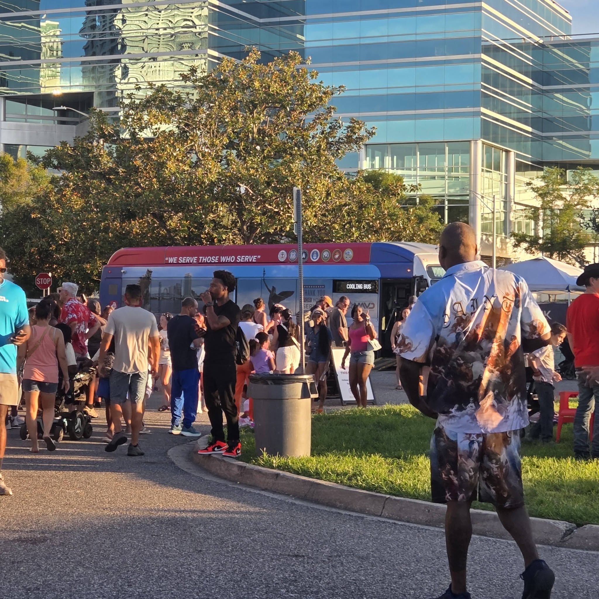 A crowd around the food trucks and the cooling bus which was much needed during Freedom Fest 250