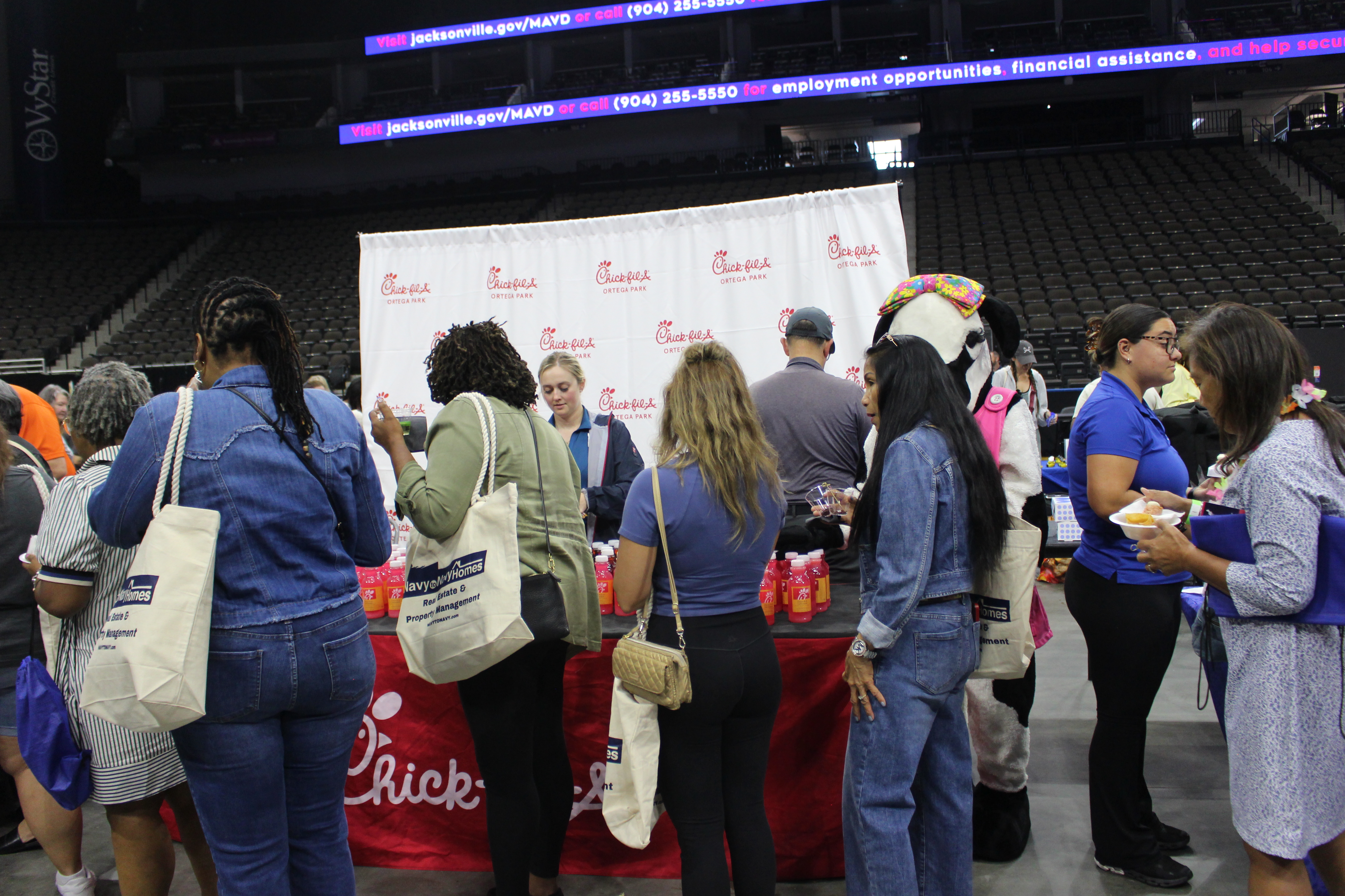Chick-Fil-A passing out sweet tea and drinks for hydration at Spouses Night Out 2026