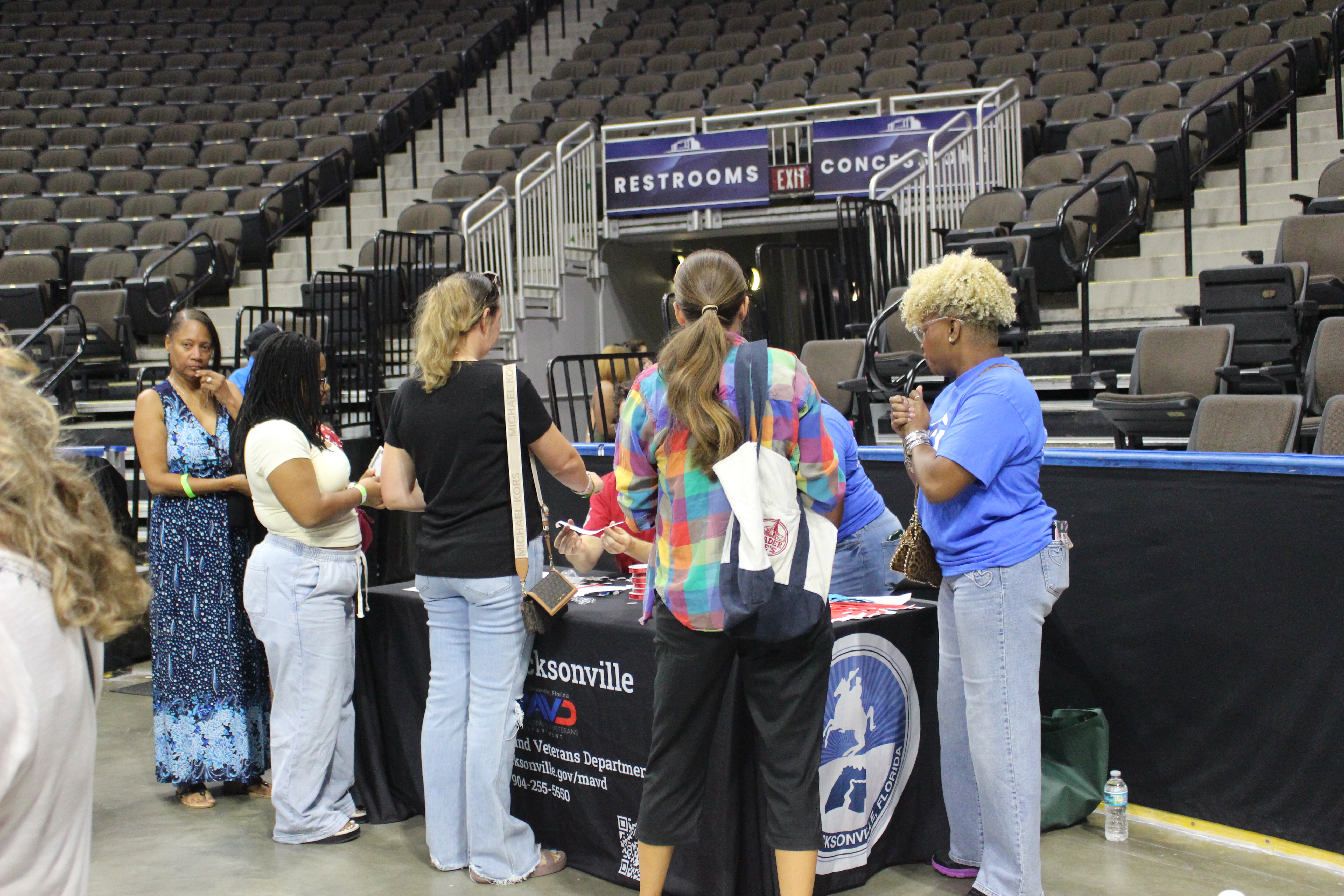 Spouses checking in at Spouses Night Out 2026