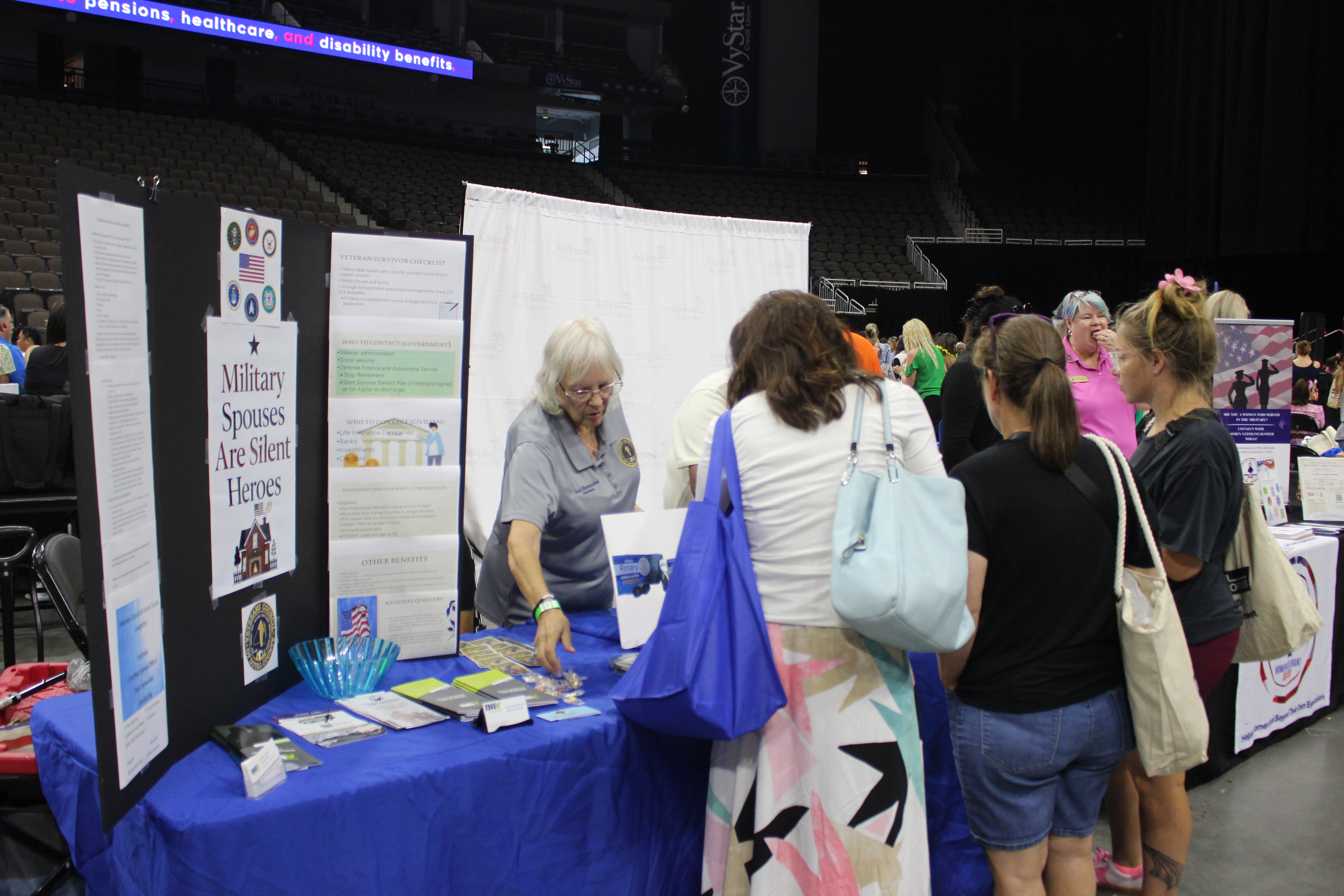 Organization VCDC passing out information at Spouses Night Out 2026 