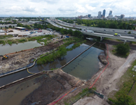 aerial view of bridge over creek