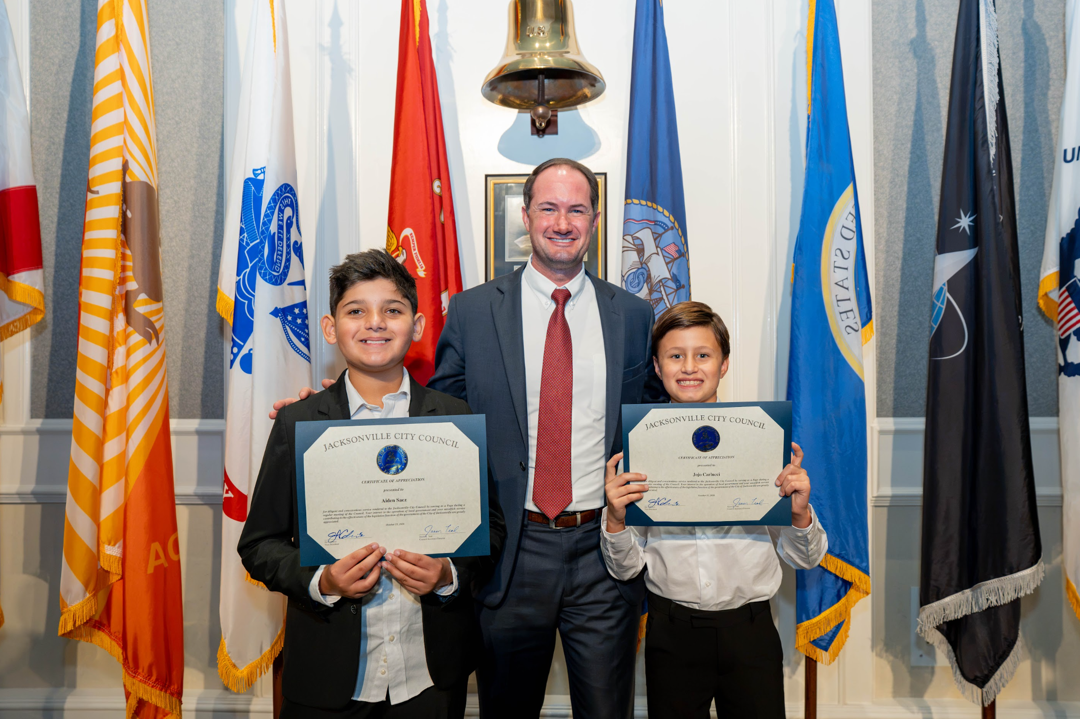 Page Program participant Aiden Saez, CVP Joe Carlucci, Page Program participant Jojo Carlucci, on October 13, 2026, at the City Council Meeting