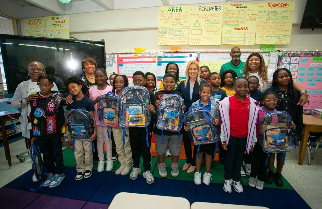 mayor and group of elementary school students in classroom