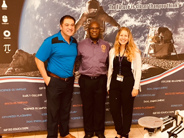 March 8, 2018 photo of Council Member Reggie Gaffney with River City Science Academy Founder Sel Buyuksarac visiting a middle school class.