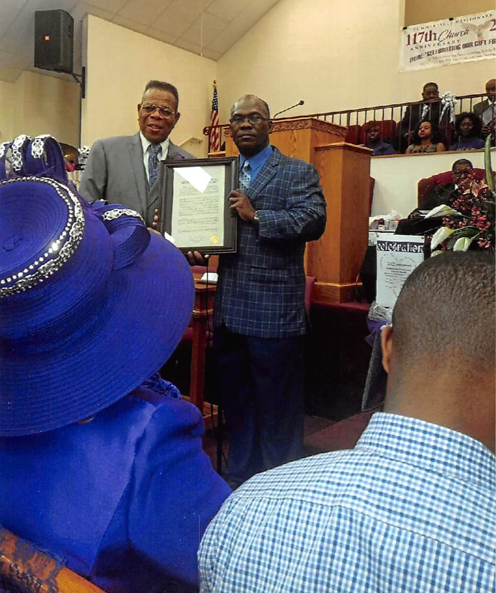 October 17, 2017 Council Member Reggie Gaffney presenting a resolution to Pastor James Wilbert Henry on his 25th anniversary at the Summerville Missionary Baptist Church. 