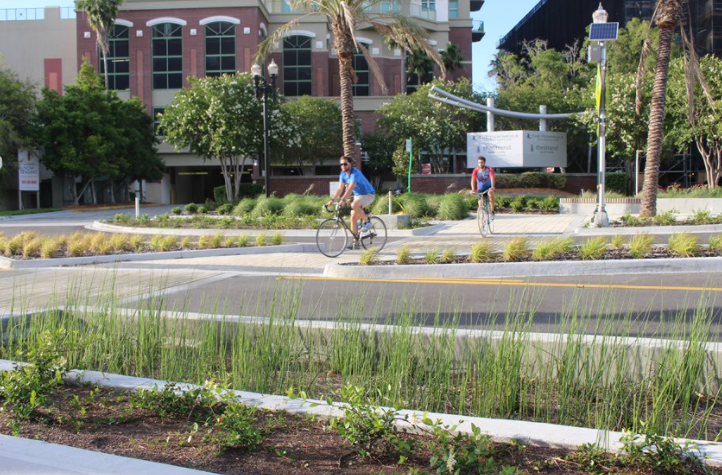 men biking on street
