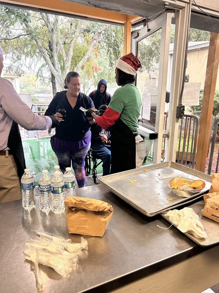CM Clark Murray Passing out food to the homeless.