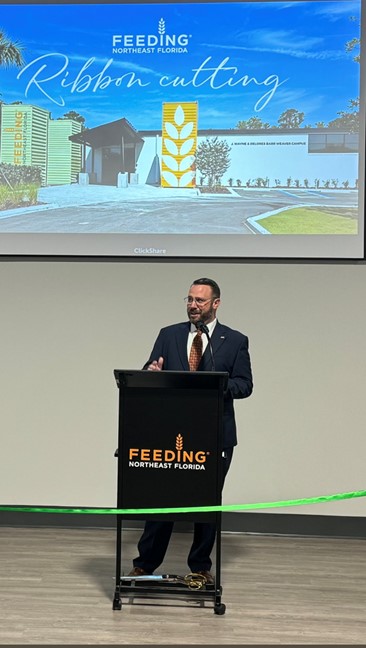 CVP Kevin Carrico speaking at the ribbon cutting for Feeding Northeast Florida.