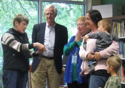 Photo of Library Director Barbara Gubbin, Council Member Bill Gulliford, and Library Ania Haller with Rachel Bennett and her sons Jax and Jay at the Southeast Regiaonal Library.