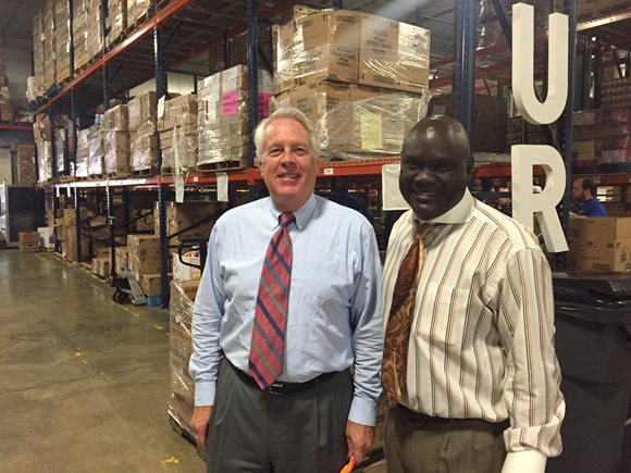 September 22, 2015 photo of Council Member Sam Newby and Feeding Northeast Florida CEO Bruce Ganger in the foodbank warehouse.