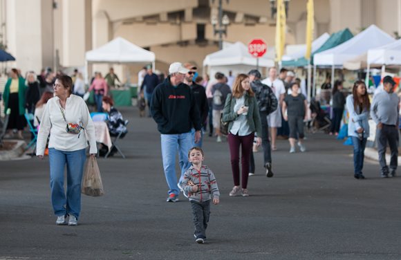 Jacksonville citizens enjoying the grand opening of the Riverside's Arts Market's 8th season.