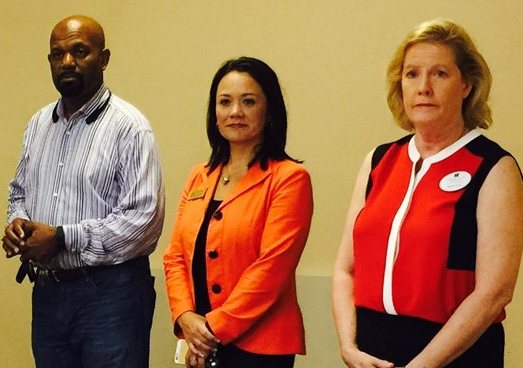 October 2, 2015 photo of Council Member Anna Brosche and city officials preparing to tour apartments at Eureka Gardens.