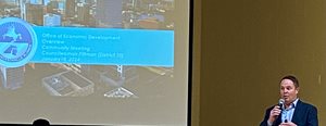 Edward-Randolph-from-the-Office-of-Economic-Development-providing-overview-at-District-10-Community-Meeting.jpg