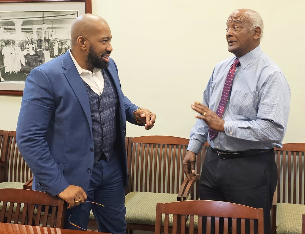 CM Rahman Johnson meets in the City Council Bob Johnson Room with Bishop Girardeau Nesbitt 