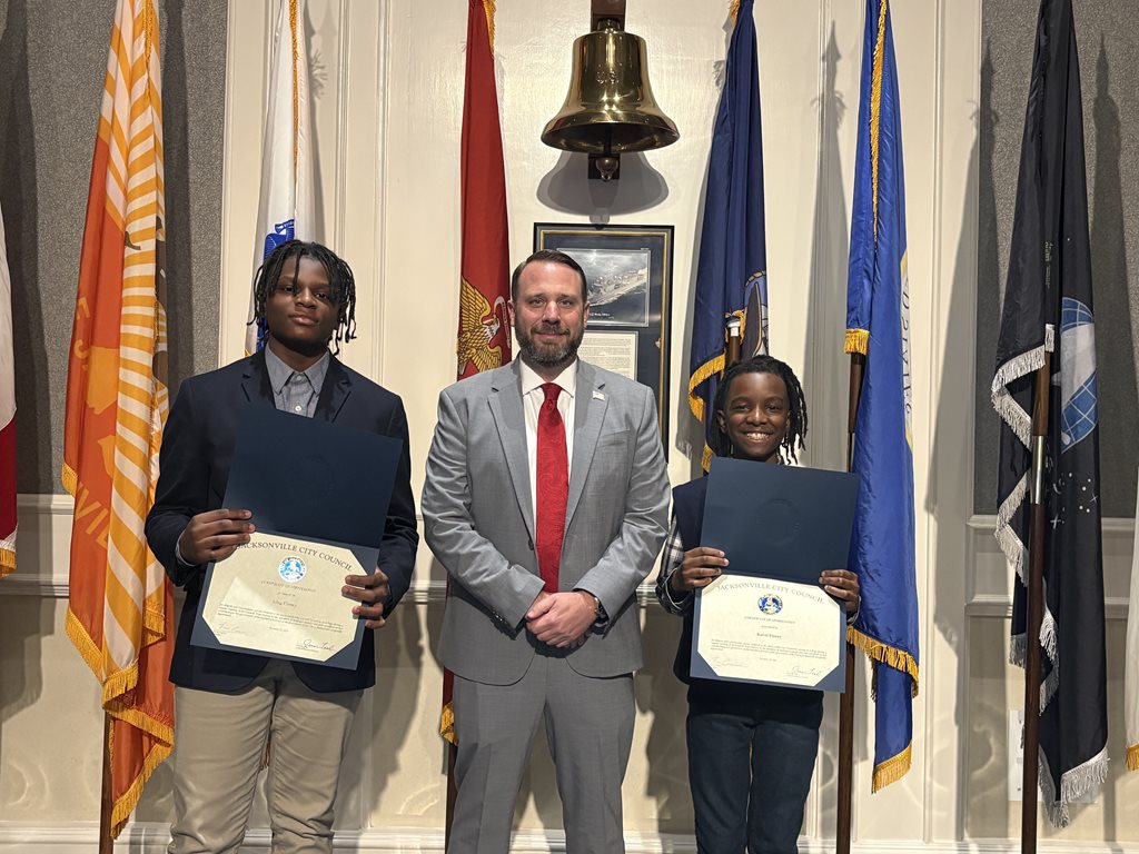 Page Program participant King Finney, CP Keven Carrico, and Kal-el Finney on November 12, 2025 at the City Council meeting.
