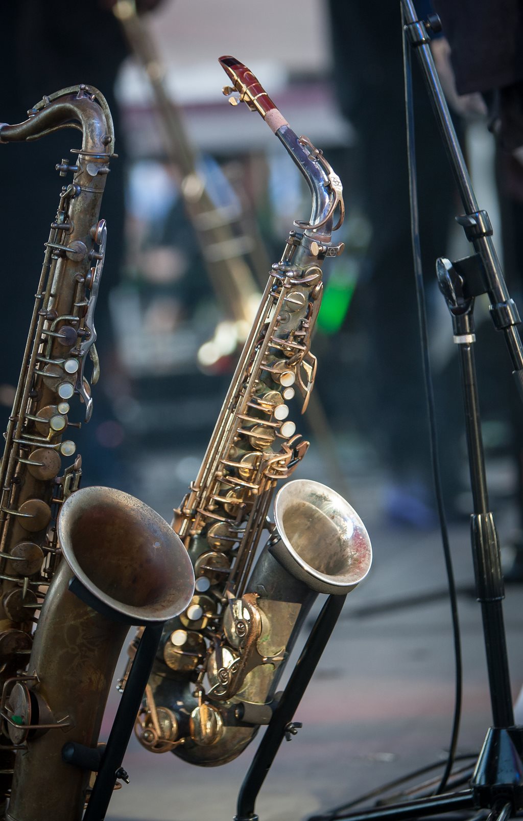 Saxophones in their stands on stage