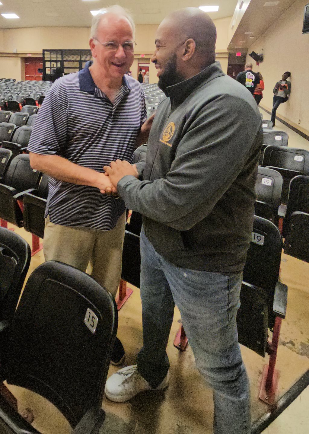 Former District 14 Council Member The Hon. John Draper chats with Dr. Johnson after a Town Hall Meeting at Westside High School. 