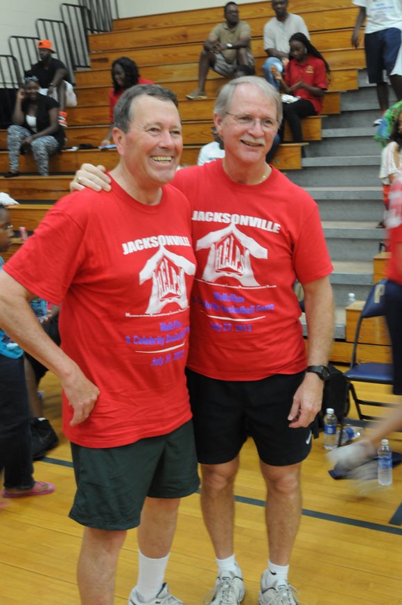 July 27, 2013 photo of Councilman Jim Love with Sheriff John Rutherford at the charity basketball game held for homeless students.