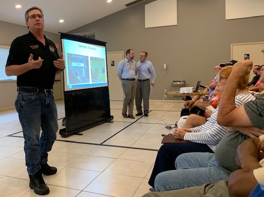 August 8, 2019 photo of Council Member Al Ferraro speaking at a community meeting to discuss a development proposal in District 2. 