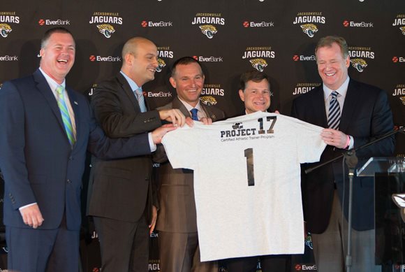 Presenting NFL Commissioner Roger Goodell with his award from Project 17.