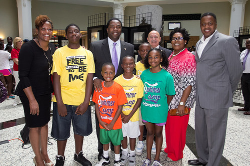 Photo of Council Member Kimberly Daniels with Mayor Brown, Council Member Brown and summer camp participant in the atrium at City Hall.  Click here to view more photos from this event.
