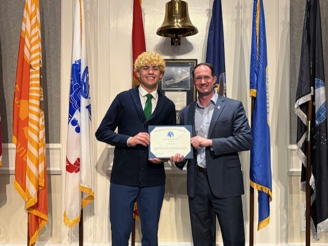 Page Program participant Jaxson Mentzer and CM Joe Carlucci on November 4, 2025 at the Land Use & Zoning Committee meeting.