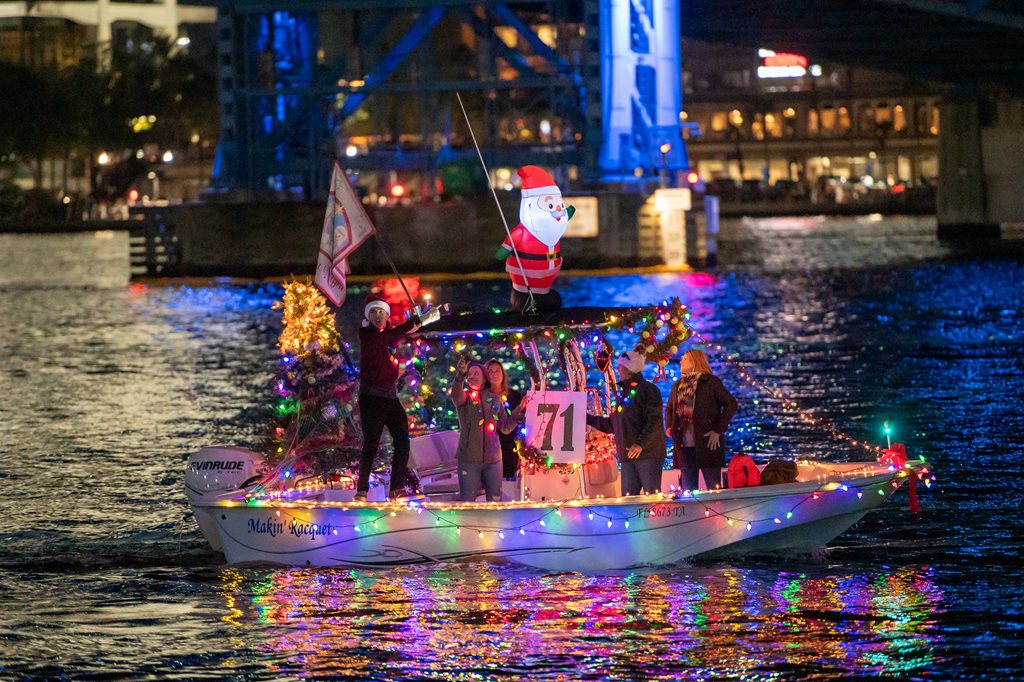 boat decorated with christmas lights