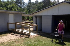 Completed wheelchair ramp built by City partners