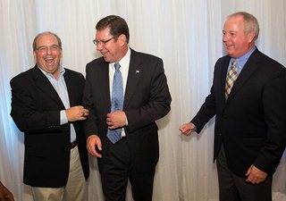 Photo of Vice President Greg Anderson speaking with Rick Morales and Tax Collector Michael Corrigan.