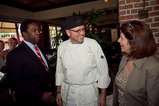 Photo of Council Member Lori Boyer and Mayor Alvin Brown speaking with a member of the San Marco business community.