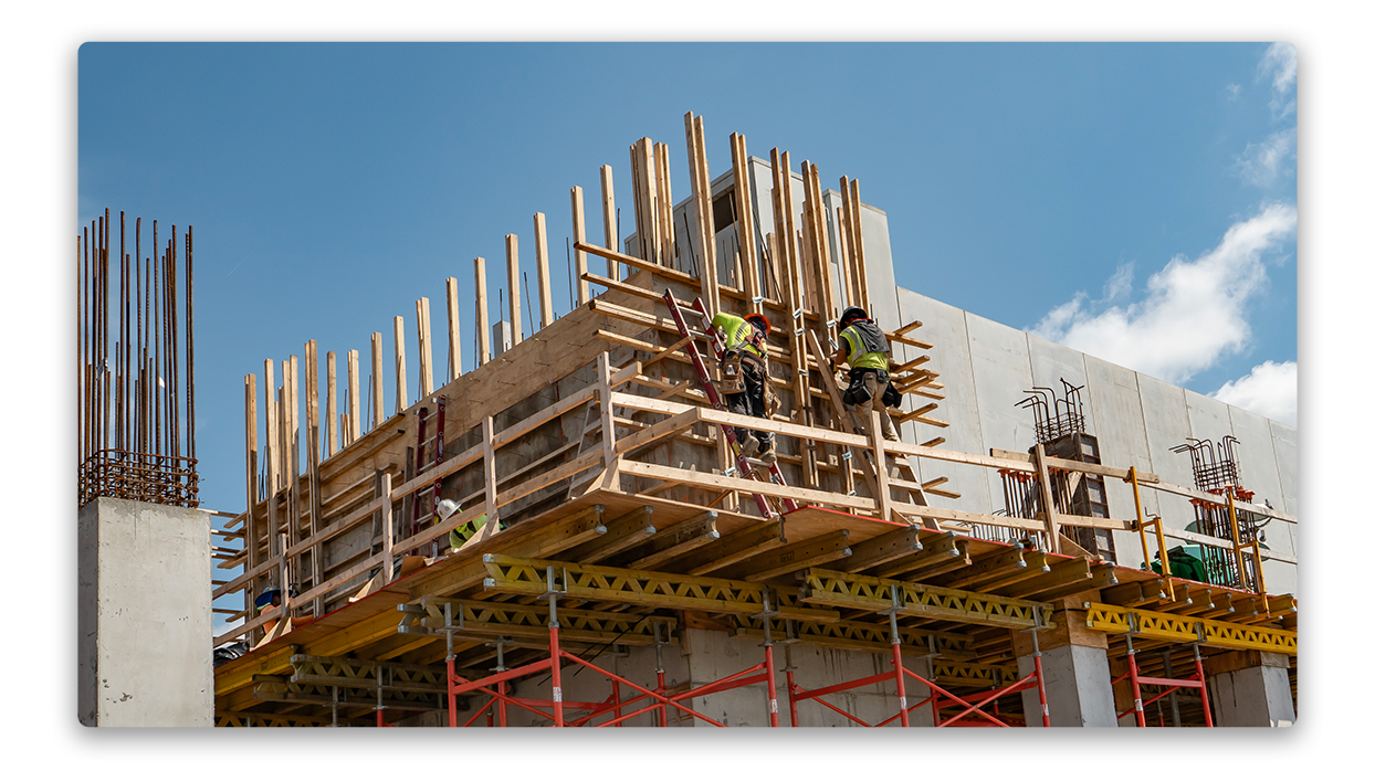 Construction workers working on a building