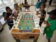 Kids playing foosball at Julian Barrs Community Center