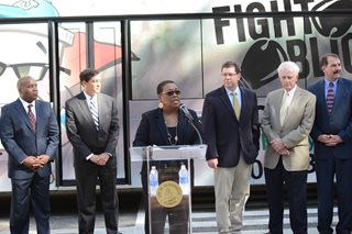 Photo of Council Member E. Denise Lee addressing the audience.