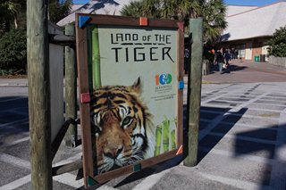 Photo of the Zoo sign for the Land of the Tiger exhibit.